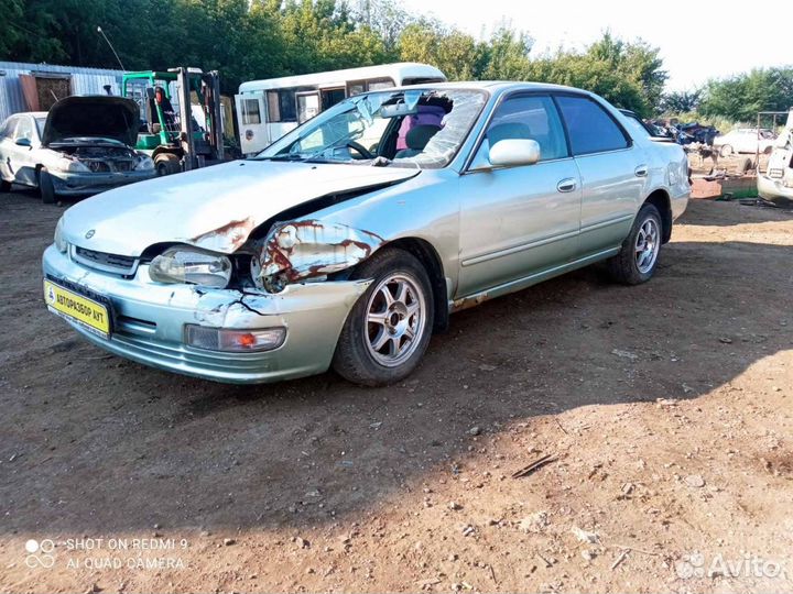 Стекло двери переднее Nissan Presea R11 GA15DE