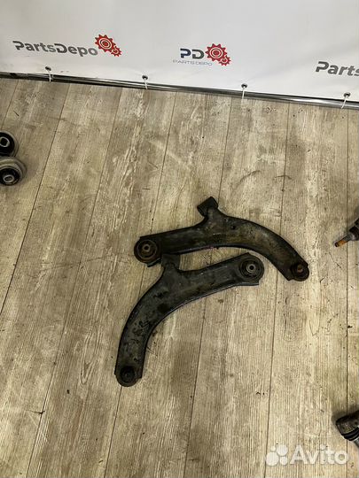 Рычаг нижний передний левый правый Nissan Note E11