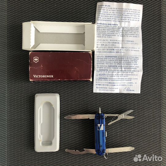 Карманный,нож от Victorinox С фонариком и ручкой