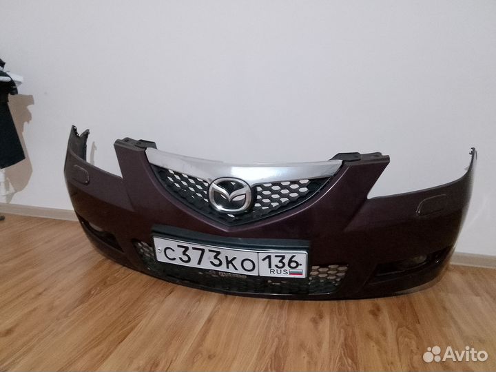 Бампер в сборе с решёткой и туманами мазда 3