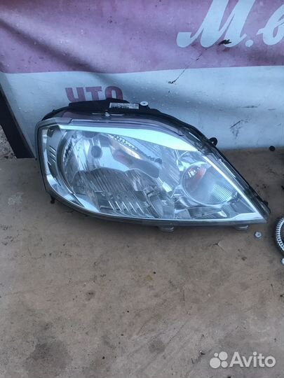 Фара renault logan 2010