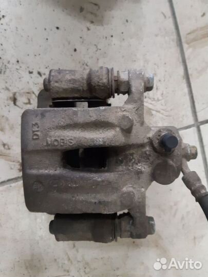 Суппорт Kia Cerato Forte передний правый