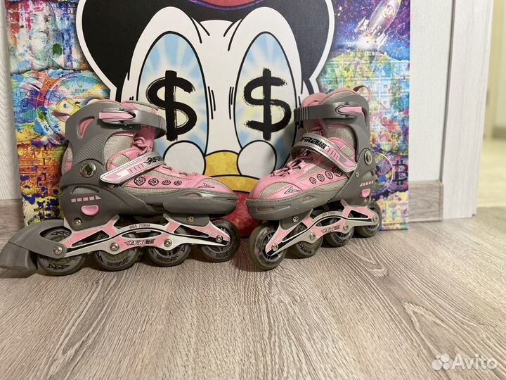 Роликовые коньки