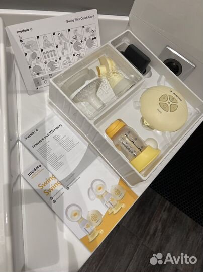 Молокоотсос medela flex swing