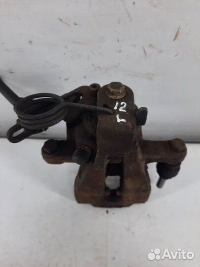 Суппорт тормозной задний левый Ford Mondeo