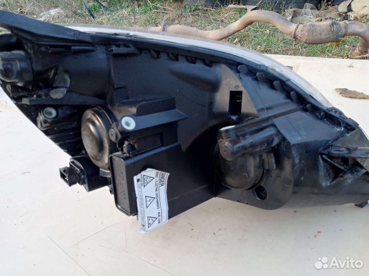 Фара передняя левая Opel zafira 2011