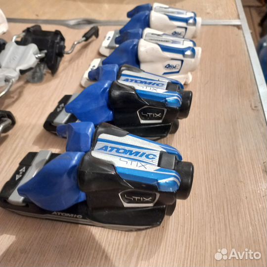 Крепления для горных лыж atomic