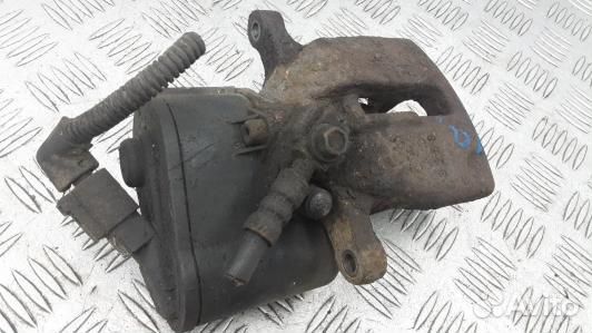 Суппорт тормозной задний левый volkswagen passat B