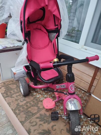 Трехколесный велосипед с ручкой