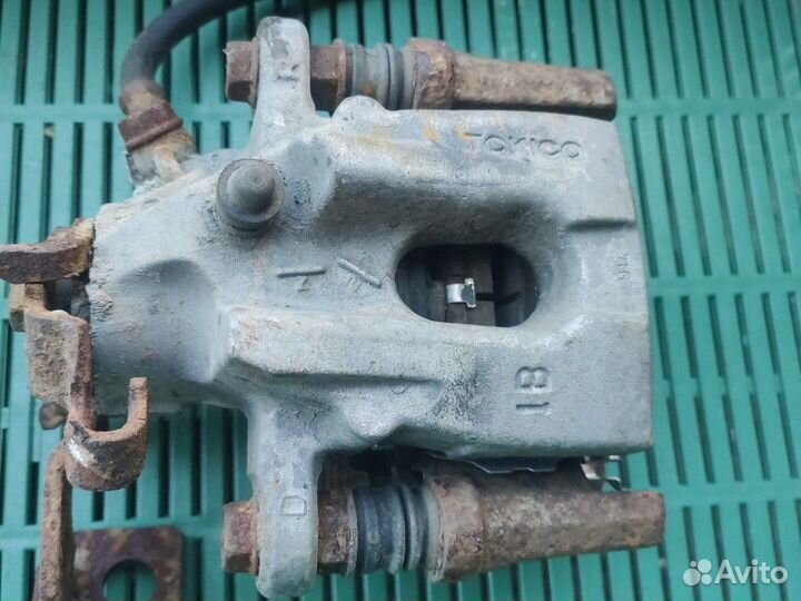 Суппорта задние Тойота Королла e 15