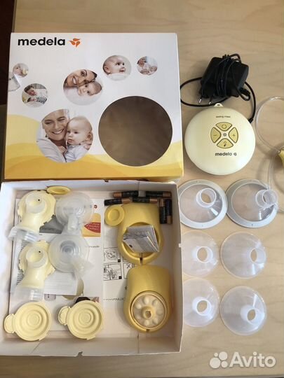 Молокоотсос medela swing maxi