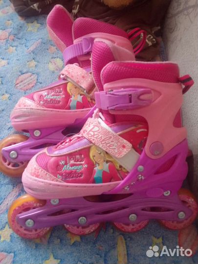 Роликовые коньки