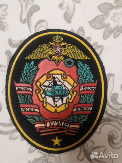 Шеврон отии