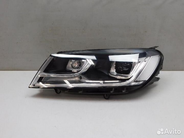 Фара левая Volkswagen Touareg