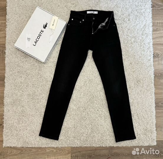 Джинсы Lacoste