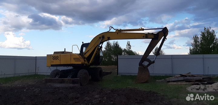 Услуги экскаватора ек18т