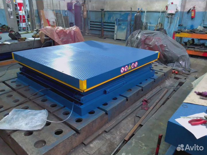 Подъемный стол