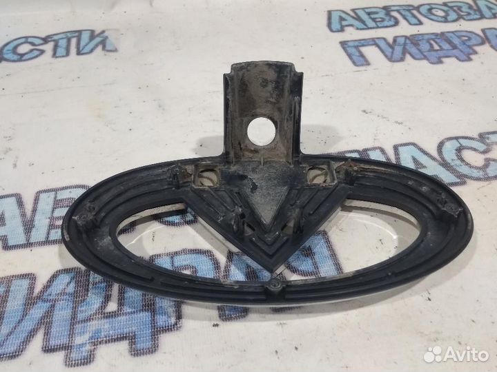 Эмблема Infiniti FX35 s51 628901CA0A На решетку ра