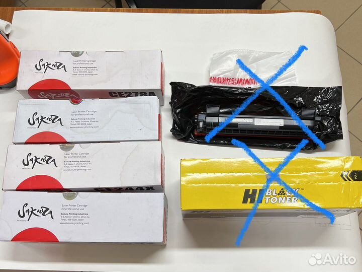 Тонер картридж новый, повреждены картонные коробки