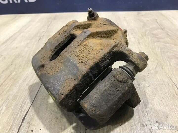 Суппорт передний правый Kia Sportage 3 2.0 G4KD