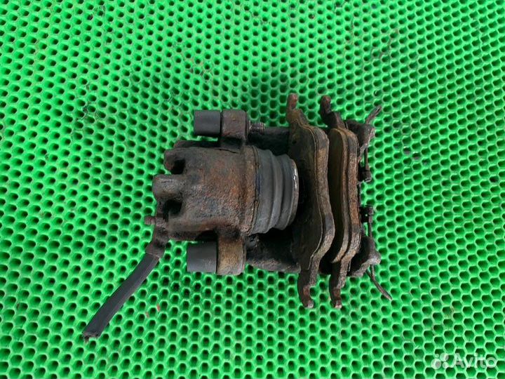 Суппорт тормозной передний левый Ford Focus 1 1.6