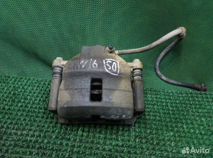 Суппорт передний левый Nissan Almera N16 N16