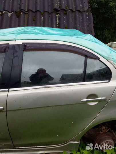 Крышка багажника Митсубиси Лансер 10