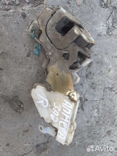 Замок двери задний Nissan Almera N 16