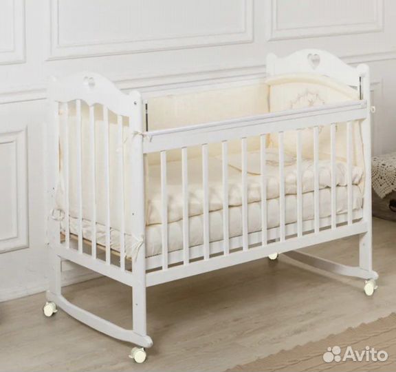 Детская кроватка с матрасом и бортиками