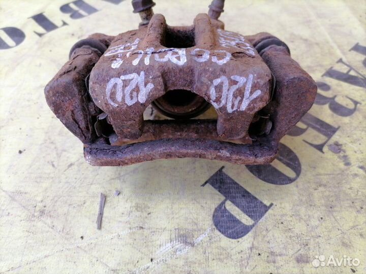 Суппорт задний левый Toyota Corolla 120 2001-2006