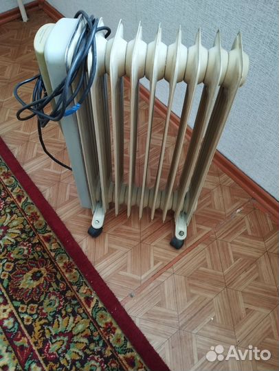 Масляный электрообогреватель