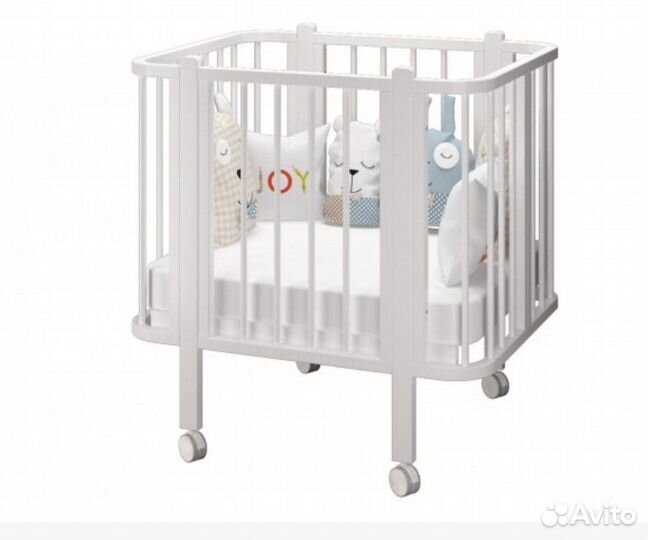 Детская кроватка с продольным маятником