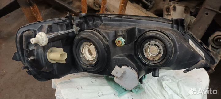 Фара левая Opel Astra G