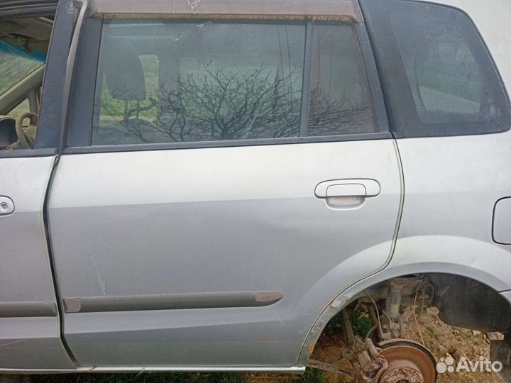Двери Mazda premacy 2001г
