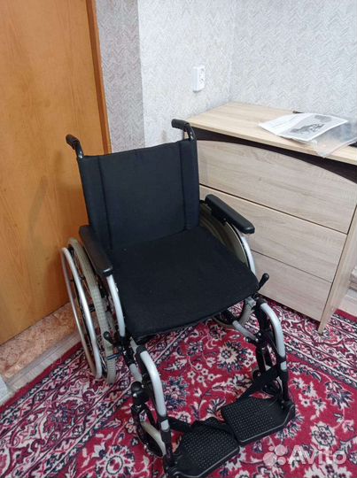 Инвалидная коляска