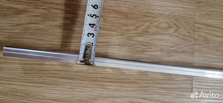 Соединительный порог между плиткой и ламинатом