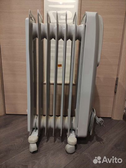 Масляный обогреватель