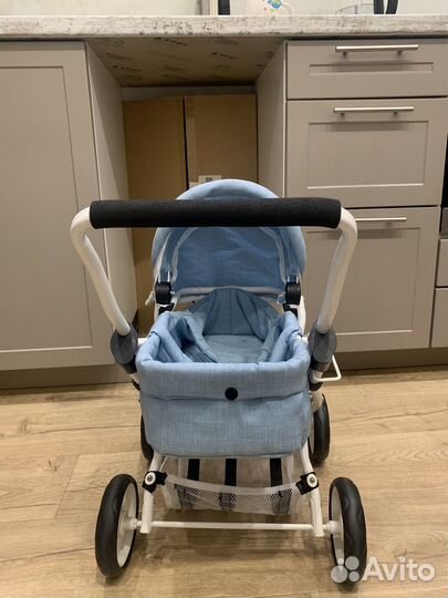 Игрушечная коляска для кукол