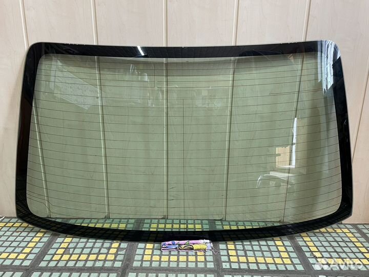 Стекло заднее Toyota Corolla Axio NZE-144 2008г