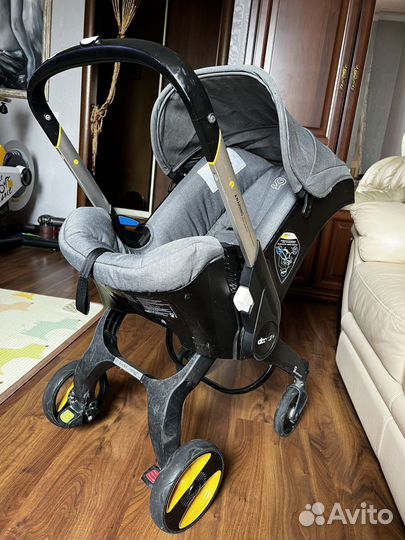 Коляска автокресло doona с базой isofix