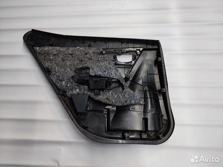 Обшивка двери задняя правая Toyota Corolla 180