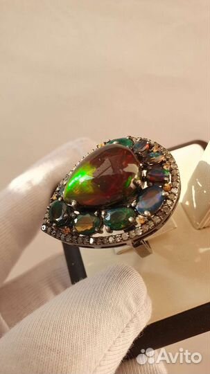 Серебряное кольцо с черными опалами