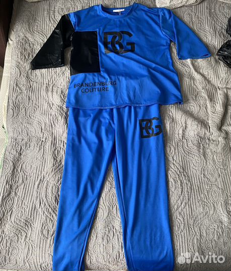 Костюм спортивный женский новый 56