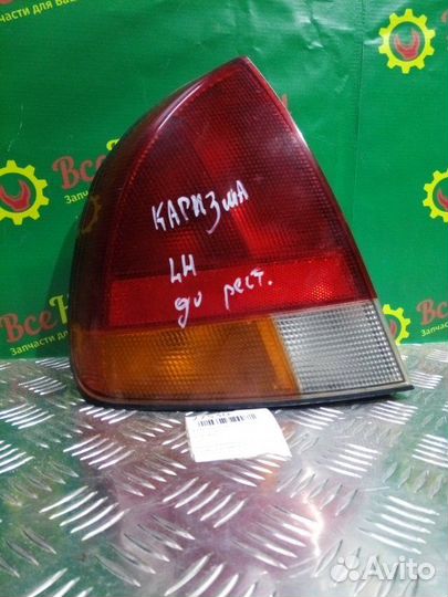 Фонарь задний левый Mitsubishi Carisma