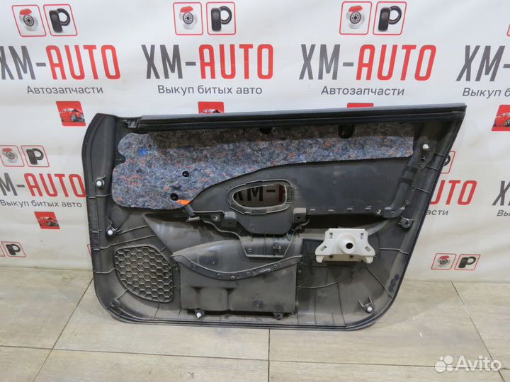 Обшивка двери передняя левая Nissan Almera G15