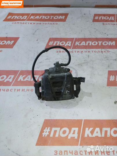 Суппорт тормозной передний левый Volkswagen Tiguan