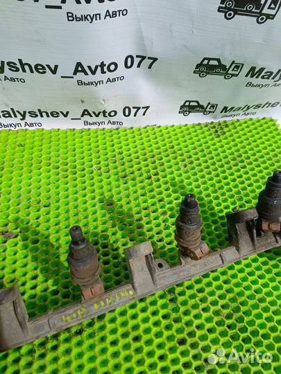 Топливная рампа всборе с форсунками Kia clarus FE