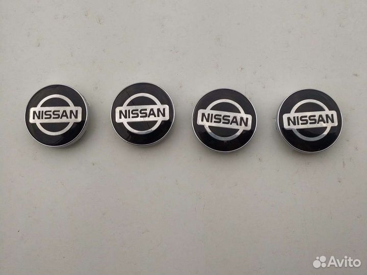Колпачки на литые диски nissan
