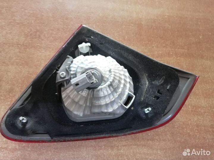 Фонарь правый в крышку багажника Corolla E150