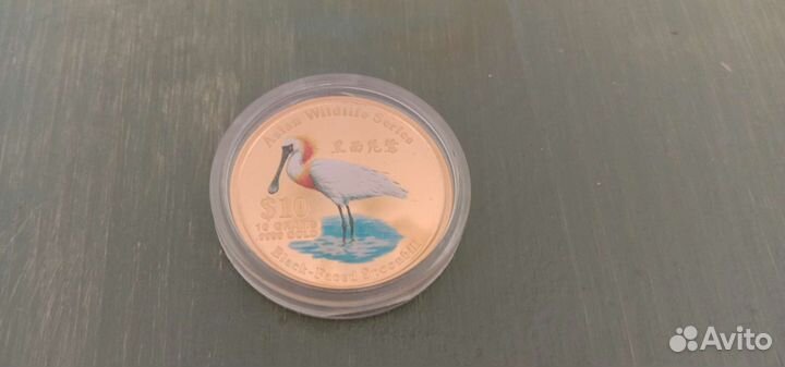 Золотая монета Острова Кука Колпица